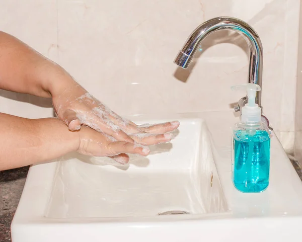 Hand Hygiene - Corona virus prevention, Cleaning Hands with Hand washing Soap. Protection by washing hands frequently