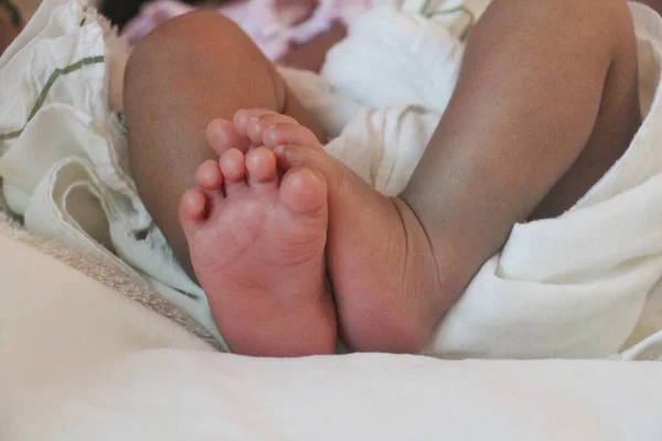 An infant foot steps for life mission