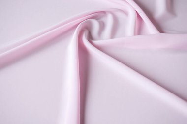 Pembe kumaş arka planda güzel pliseli