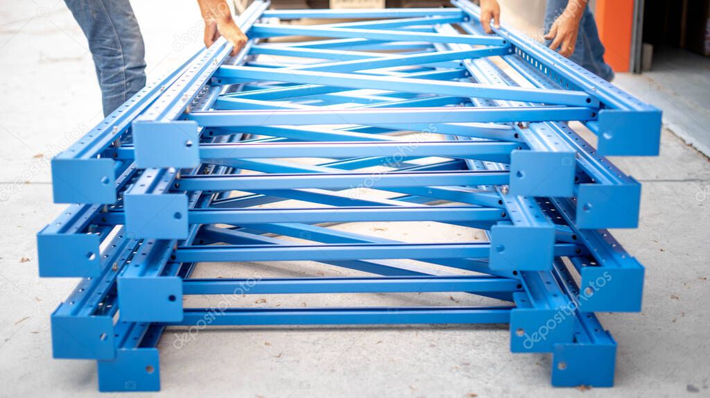 The blue of metal rack prepare to assembling  in warehouse or storage and shelves for put cardboard boxes of products.