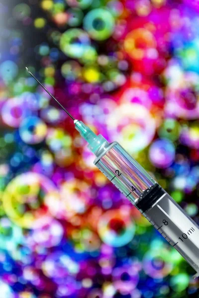 Closeup of medical syringe with hypodermic needle