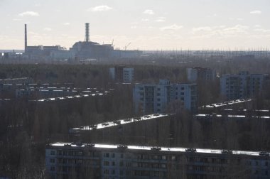Terk edilmiş hayalet kasaba Pripyat, kıyamet sonrası şehir, nükleer santral manzarası, Çernobil 'de kış mevsimi yasaklama bölgesi, Ukrayna