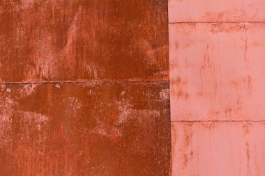 Kırmızı ve pembe paslı metal levhalar, pas dokusu, Çernobil 'de radyoaktif çelik.