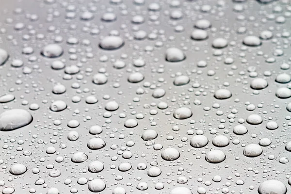 Borrosa de gota de agua en el suelo — Foto de Stock