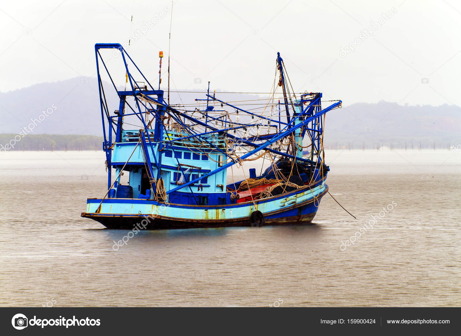 Squid fishing boats on the ocean view background at Thailand — Stock Photo  © nitimongkolchai #159900424
