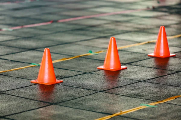 Red cone on the floor for made line — Stock Photo, Image