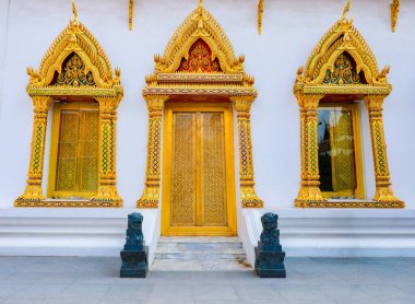 Architecture of windows and elaborately decorated pillars.Bangko