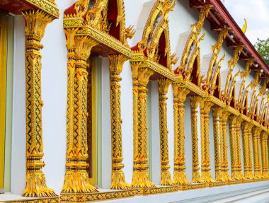 Architecture of windows and elaborately decorated pillars.Bangko