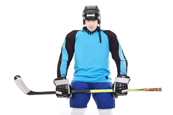 Hockeyspieler auf weißem Hintergrund. — Stockfoto