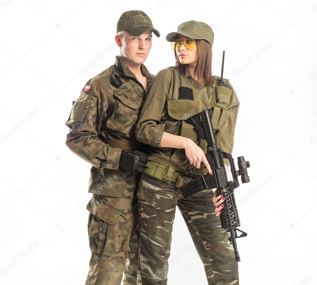 Man and woman in soldier's suit on white background.