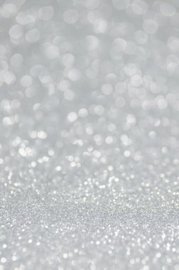 Odaklanamayan soyut gümüş ışıklar arka planı