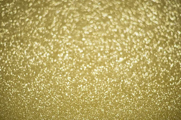 Desfocado abstrato ouro luzes fundo — Fotografia de Stock