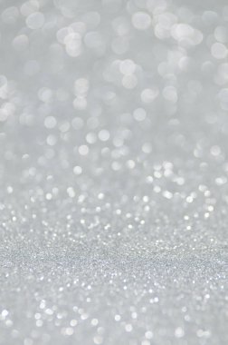 Odaklanamayan soyut gümüş ışıklar arka planı