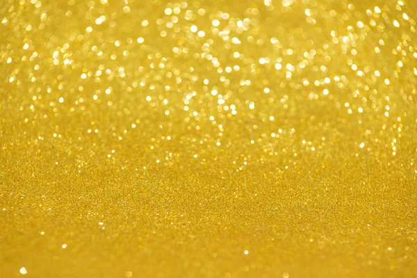 Defokussiert abstrakte Goldlichter Hintergrund — Stockfoto