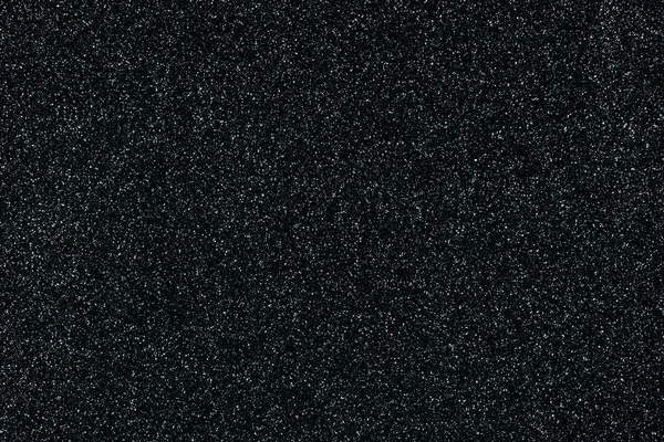 Zwarte glitter textuur abstracte achtergrond — Stockfoto