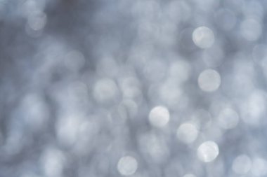 Soyut, parlak, bulanık gümüş parlayan arkaplan 