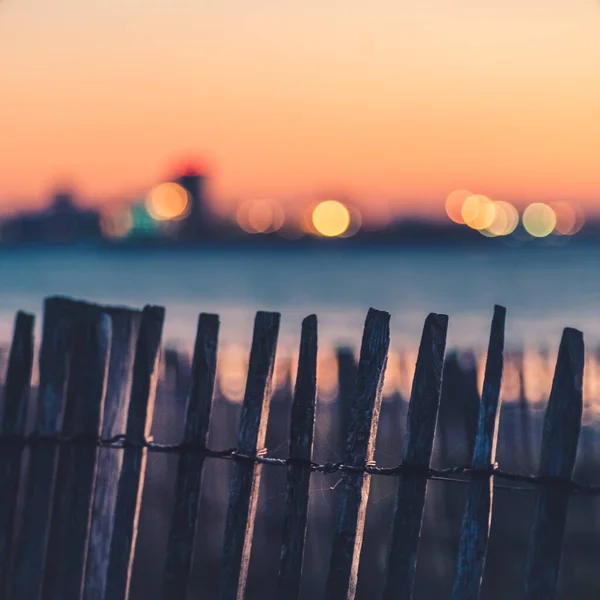 Close Old Wooden Fence Sea Sunrise Colorful City Light Blurred — Stock Photo, Image