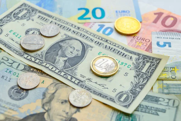 Euro and dollar coins and banknotes; Euro vs Dollar; currency