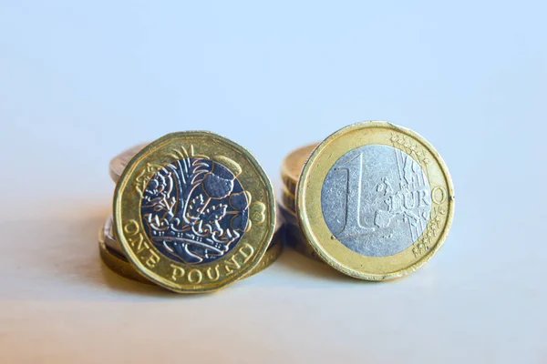 Euro and Pound coins; Euro vs Pound