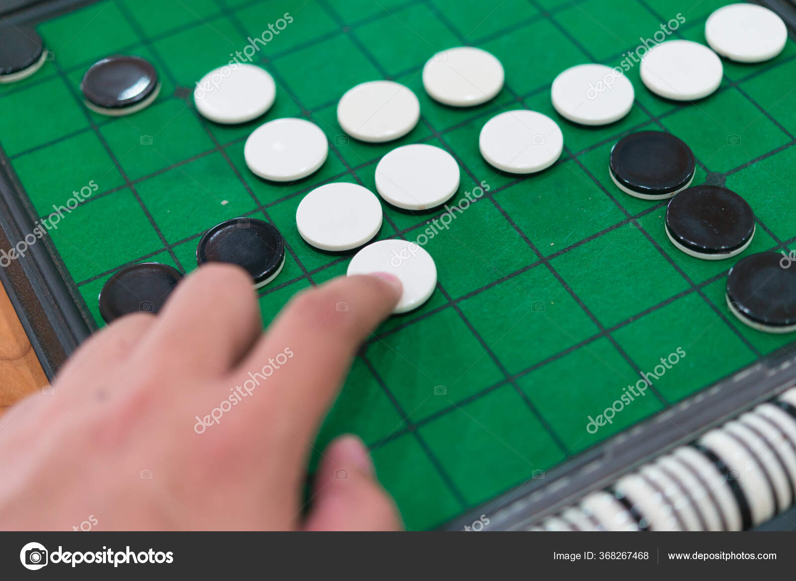 Closeup Discs Green Reversi Board Othello Hand Strategy Business Concept Stock Photo By C Athipati D Gmail Com Closeup Discs Green Reversi Board Othello Hand Strategy Business Concept Stock Photo By C Athipati D Gmail Com