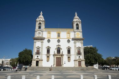 the Igreja do Carmo in the old town of Faro in Portugal  clipart