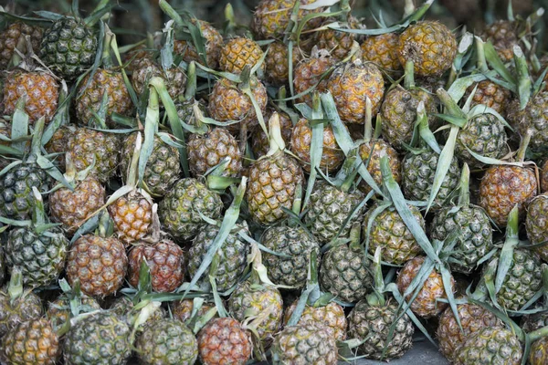 Pineapples at a market, Thailand. — Stock Photo, Image