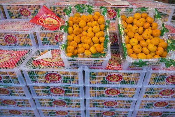 Mandariner eller pynt på et marked - Stock-foto