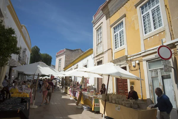 stock image a alley with the Saturday Market in the town of Loule