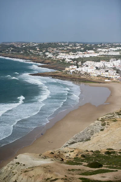 The beach with the village of Luz in Portugal — Stock Photo, Image