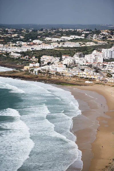 The beach with the village of Luz in Portugal — Stock Photo, Image