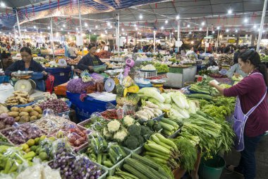 vegetables at the marketstreet at the food market in of the city Buri Ram in Isan in Northeast thailand. Thailand, Buriram, November, 2017. clipart