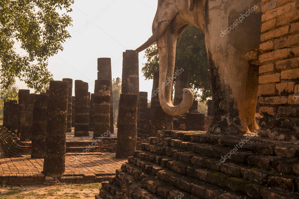 the Wat Chang Lom Temple in the Historical Park in Sukhothai in the Provinz Sukhothai in Thailand.   Thailand, Sukhothai, November, 2019