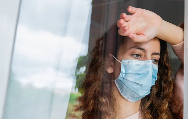 Coronavirus Young Woman Coronavirus Isolated Home Looking Out Window Protected — Stock Photo, Image