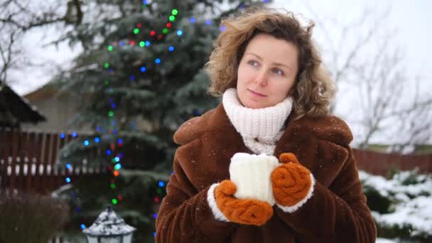 People, Xmas, Drinks And Leisure Concept - Young Woman With Cup In Winter — Stock Video