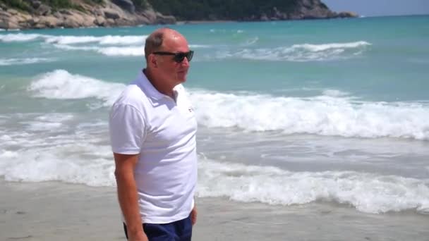 Middle-Aged Successful Man Walking on Beach on Holidays — Stock Video