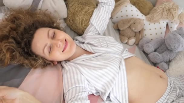 Happy Pregnancy Concept. Cheerful Pregnant Woman Lying In Bed At Home In Bedroom. — Stock Video