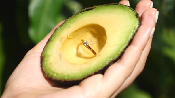 Marriage Proposal Trend With Wedding Ring In Avocado — Stock Video