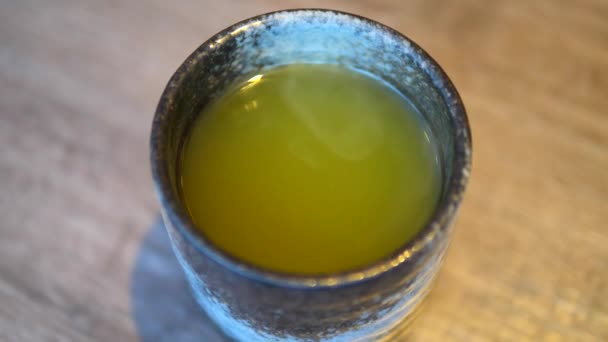 Closeup Of Hot Green Tea In A Cup — Stock Video