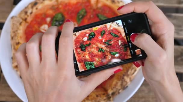 Close-Up Woman Hands Taking Pictures Of Vegan Pizza By Smartphone — Stock Video