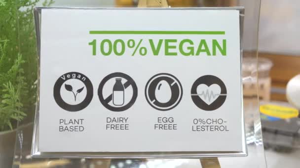 Vegansk Logga in hälsosam restaurang. Växtbaserad, Mejerifri, Äggfri, Ekologisk. — Stockvideo