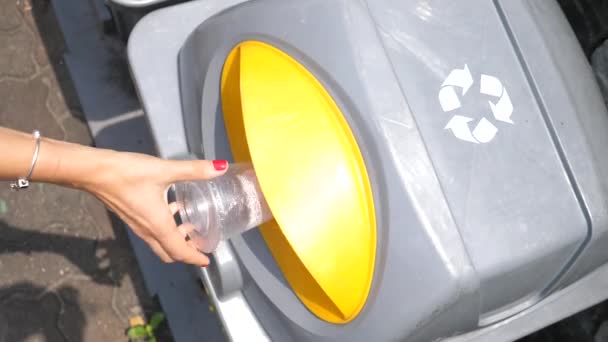 Female Hand Throwing Garbage In Rubbish Bin — Stock Video