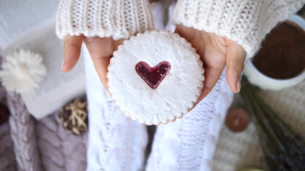 Softness, Comfort, Holiday, Feast, Coziness Concept. Cookie With Heart In Hands. — ストック動画