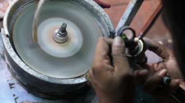 Craftsman Showing Old Technique Of Gem Cutting And Faceting