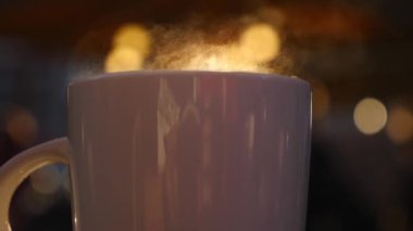 Bokeh Işıklı Sıcak Çay ya da Kahve Fincanı