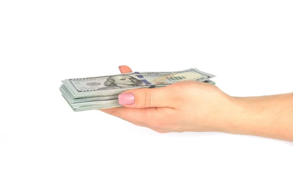 Női kéz tart 100 dollár bankjegyek elszigetelt fehér background. Közelről — Stock Fotó