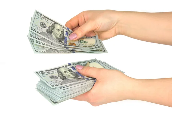 Female hands consider dollars on a white background — Stock Photo, Image