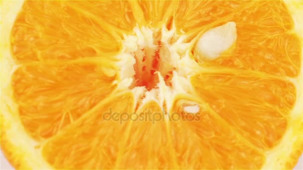 Tranche d'orange rotative, macro. Aliments biologiques frais et sains — Video