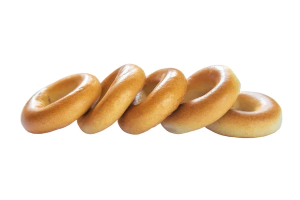 Raw of baked bagels on white background — Stock Photo, Image