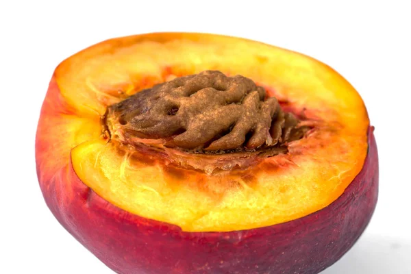 Macro weergave van smakelijk halve perzik als behang — Stockfoto