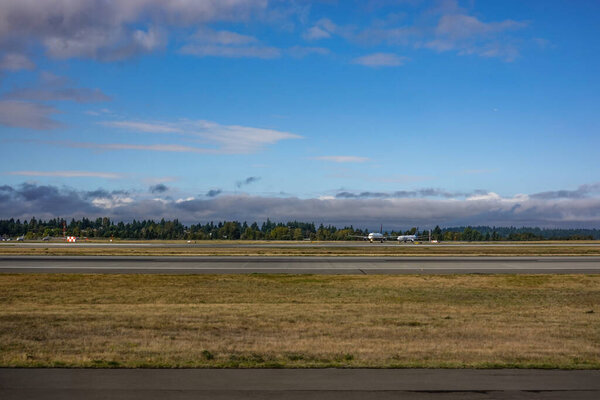Seattle, WA/USA-9/16/19: A view of the runway and jet airplanes ready to takeoff at the Seattle airport.